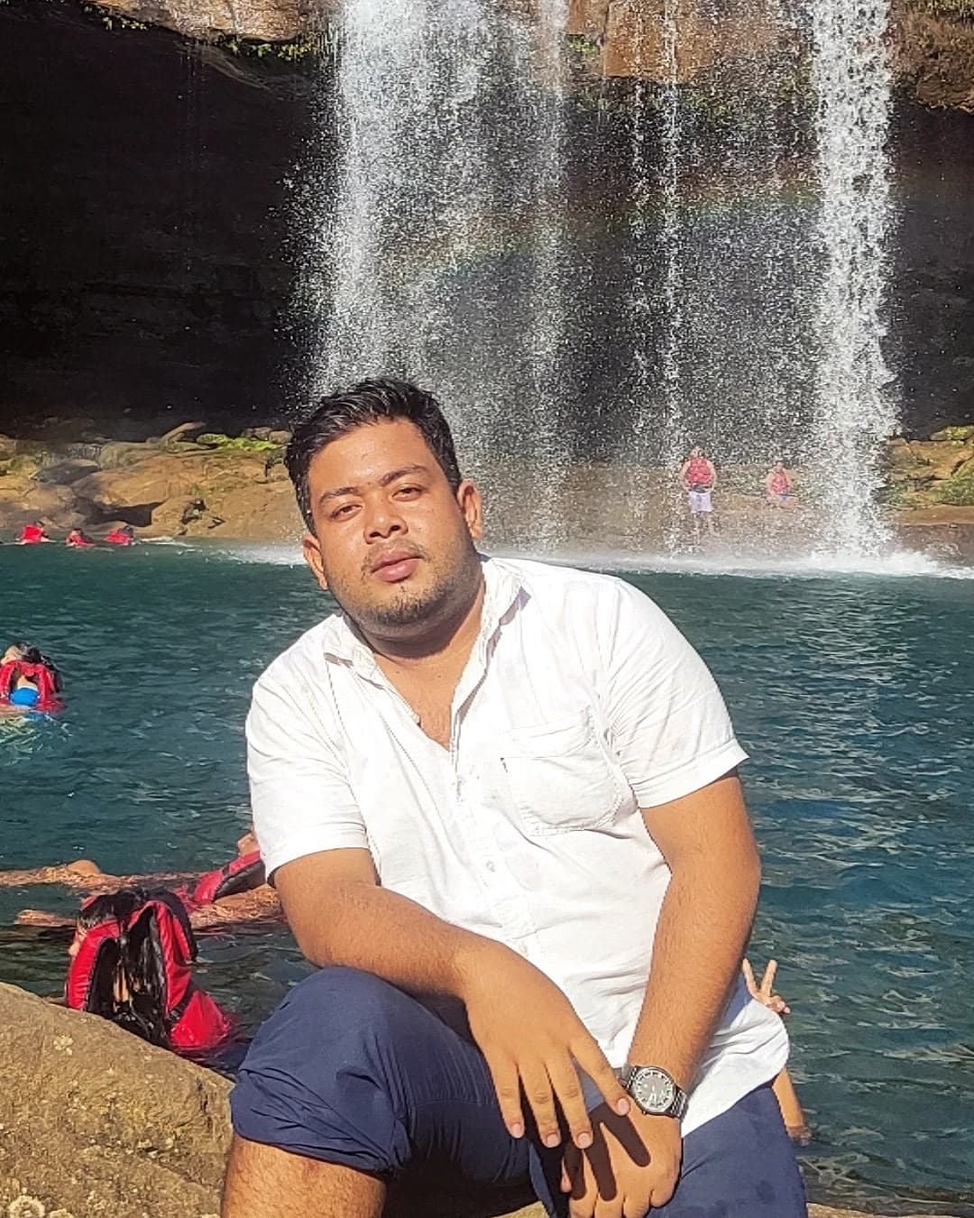 Portrait of Bonjeet, relaxed and outdoors